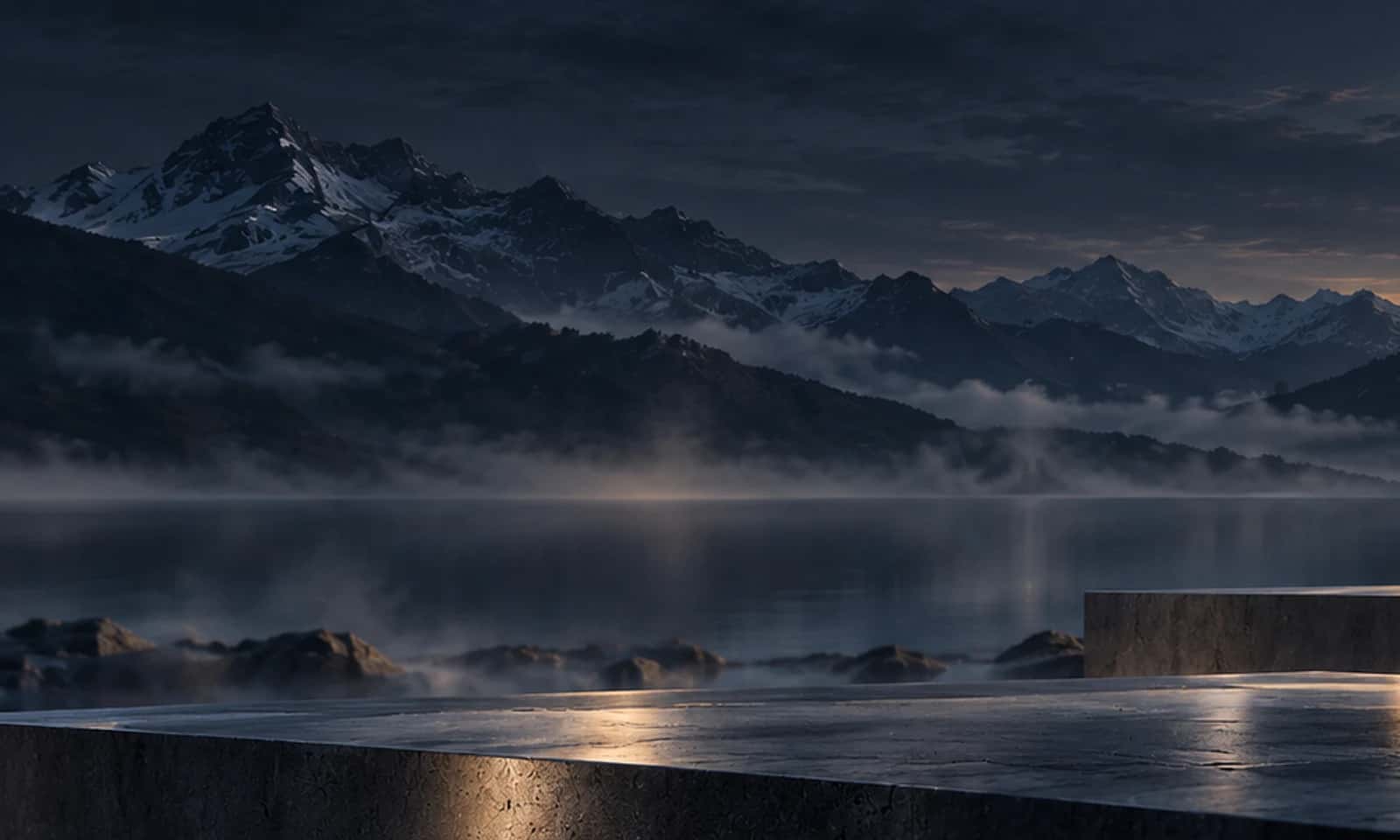 Mountain range under a pale sky, at dusk